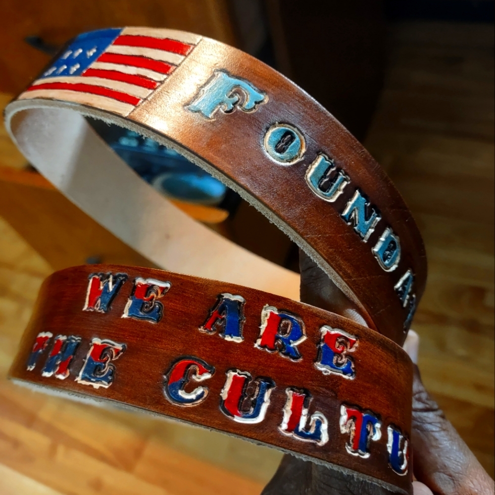 Foundational black American leather belt , size 42 .